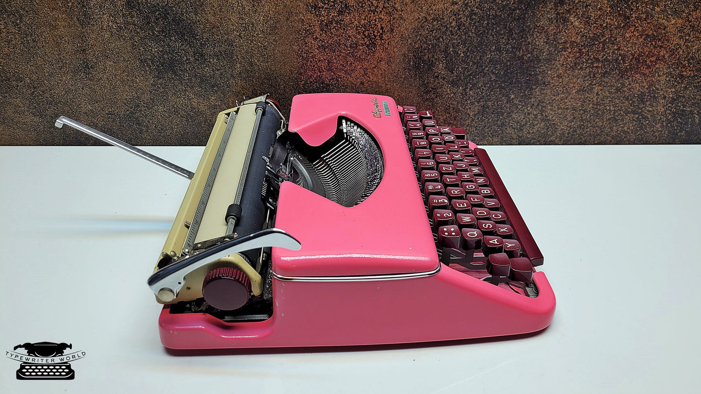 Antique Olympia Splendid 33/66 Pink Typewriter with Matching Case and Burgundy Keys | Rare Mechanical Keyboard for Writers and Collectors