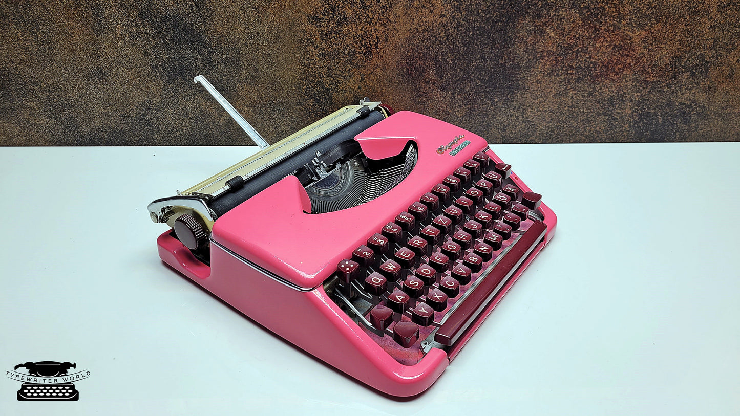 Antique Olympia Splendid 33/66 Pink Typewriter with Matching Case and Burgundy Keys | Rare Mechanical Keyboard for Writers and Collectors