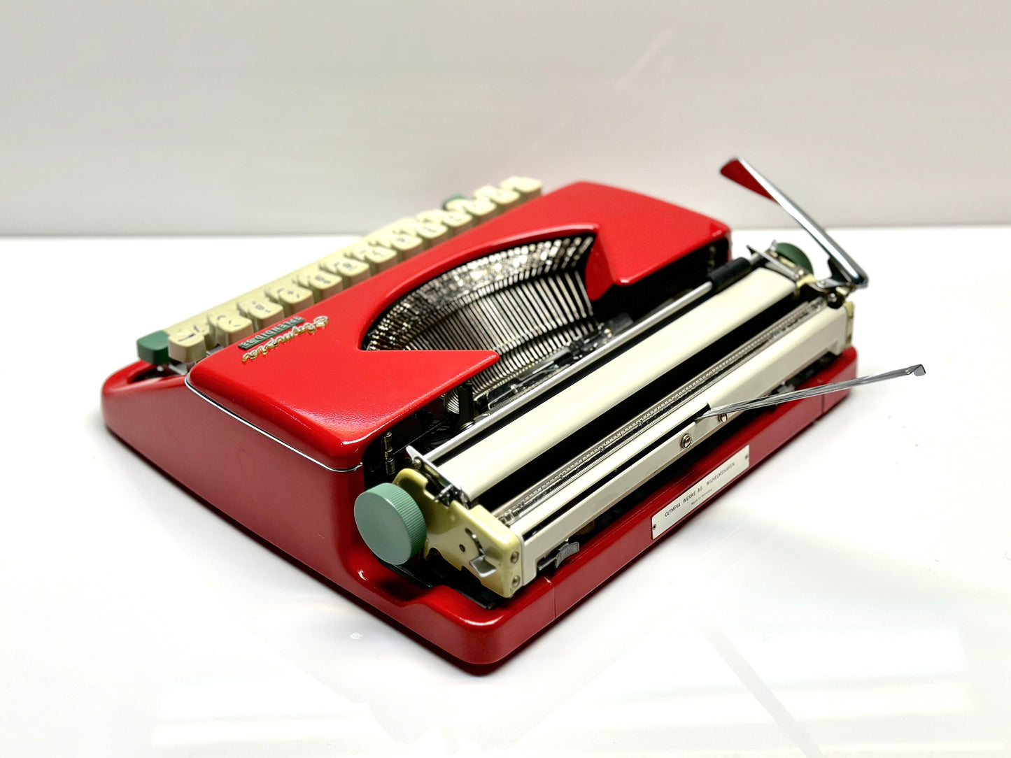 Olympia Splendid 33/66 Typewriter, Red Elegance with Matching Bag and White Keyboard - Vintage Charm from the 1960s
