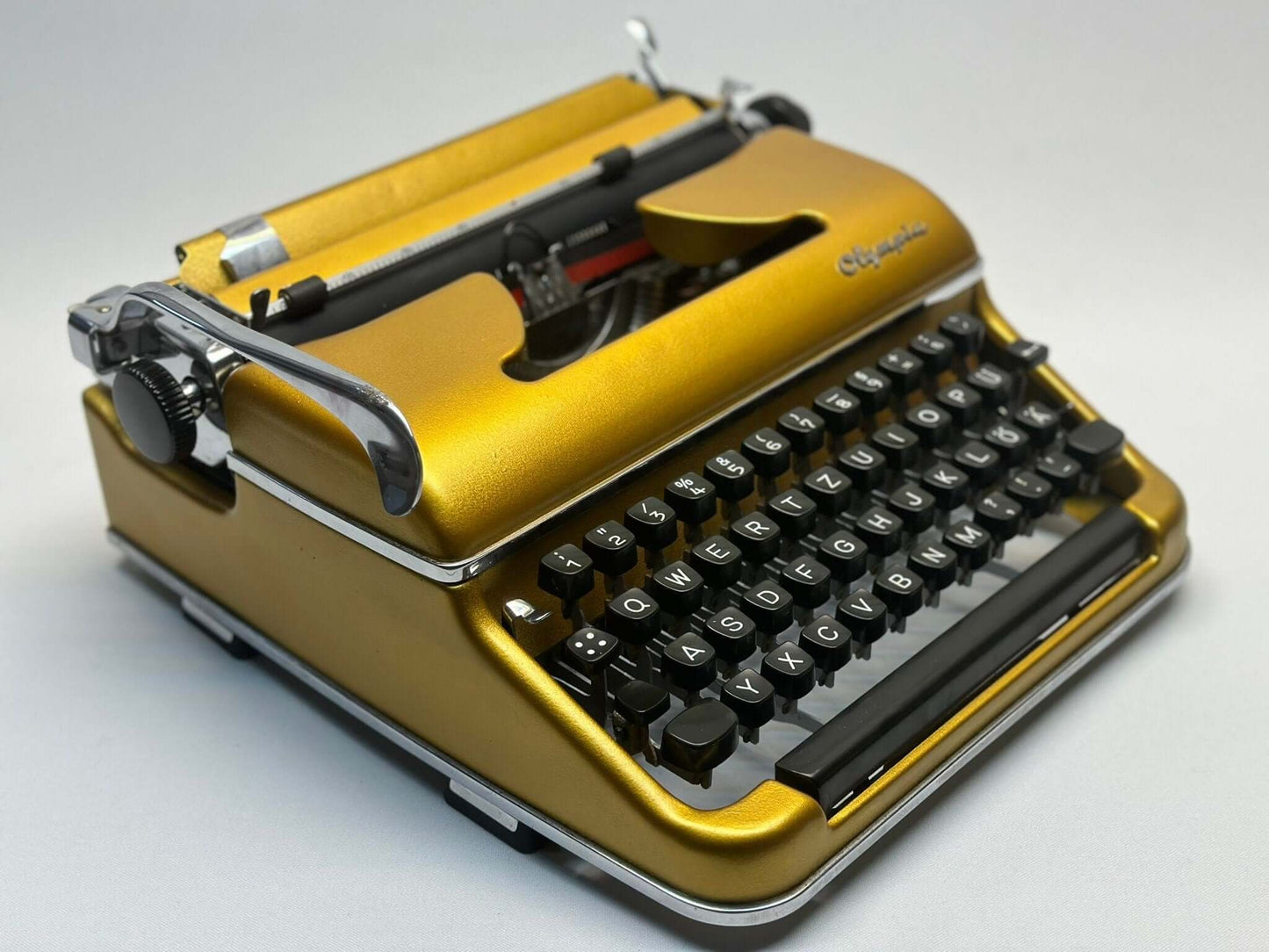 Premium Gold Olympia SM3/SM4 Typewriter - Vintage 1955 Model in Luxurious Gold Finish with QWERTZ Layout