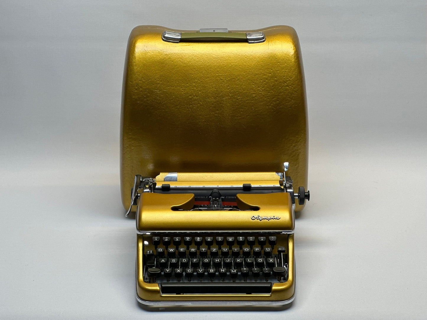 Gold Olympia SM3/SM4 Typewriter - Vintage 1955 Model in Luxurious Condition | Collectible and Functional