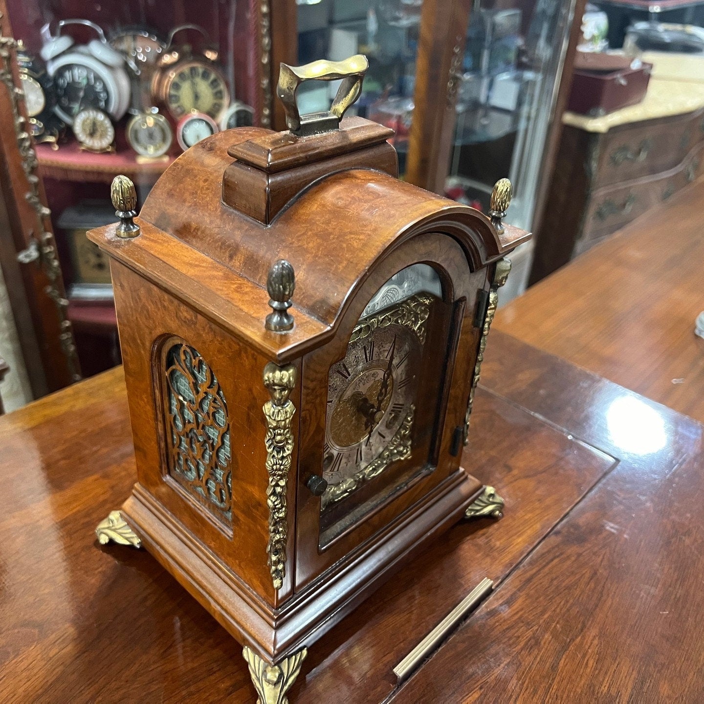 Antique Hermle Double Wind Wood Mantel Clock with Ornate Design and Brass Accents