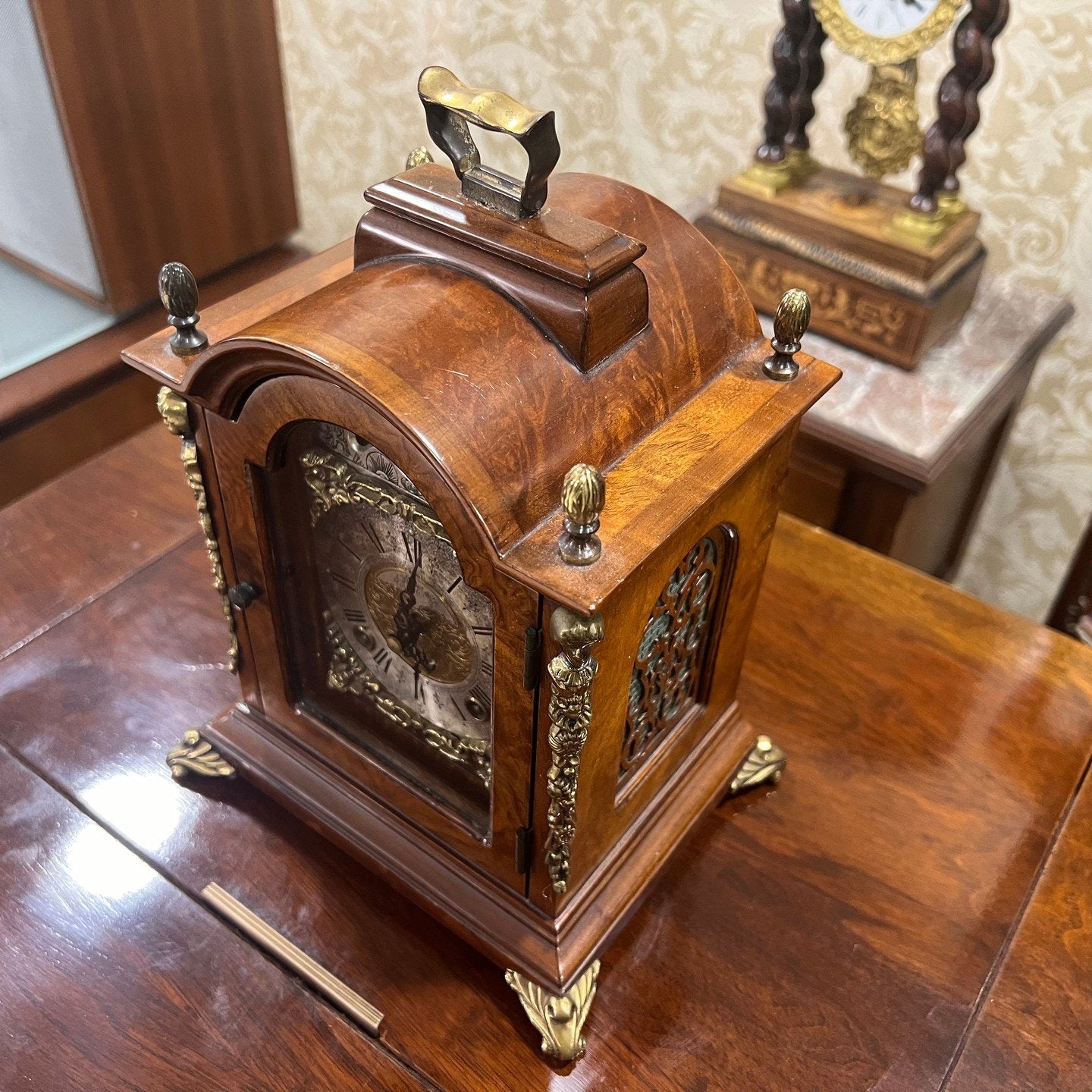 Collectible Antique Hermle Double Wind Wood Mantel Clock in perfect condition displayed on wooden surface