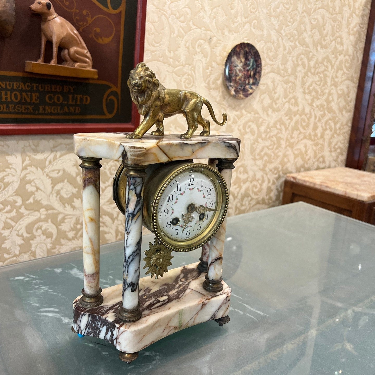 Collectible antique French marble base mantel clock in pristine condition displaying superior craftsmanship.