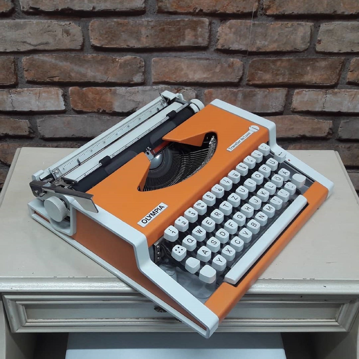 Olympia Traveller Deluxe Typewriter - Fully Functional, Vibrant Orange, and Includes a Stylish White Bag