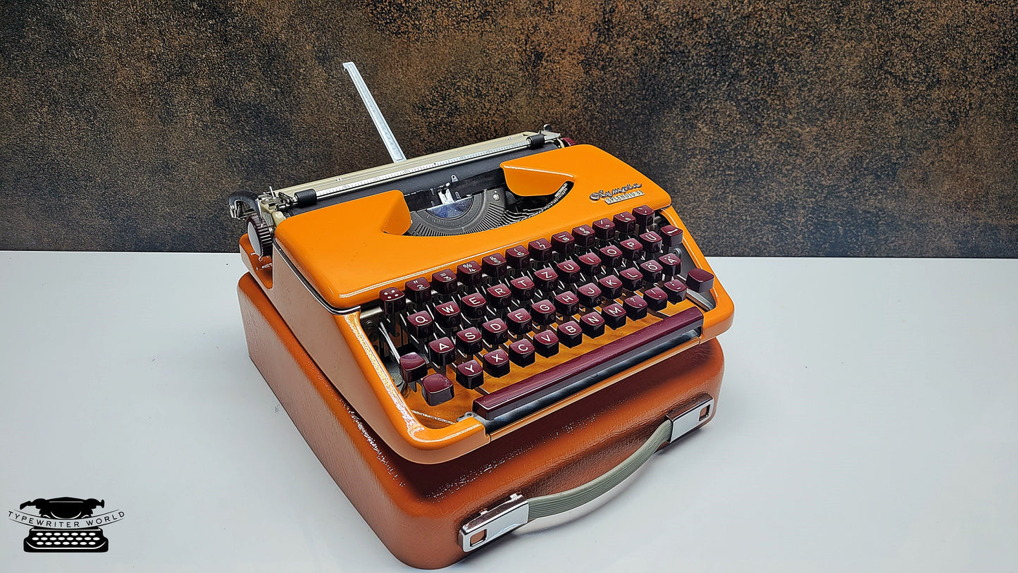 German-Made Olympia Splendid 33/66 Orange Typewriter with Mechanical Burgundy Keyboard and Case | Fully Refurbished Rare Writing Machine