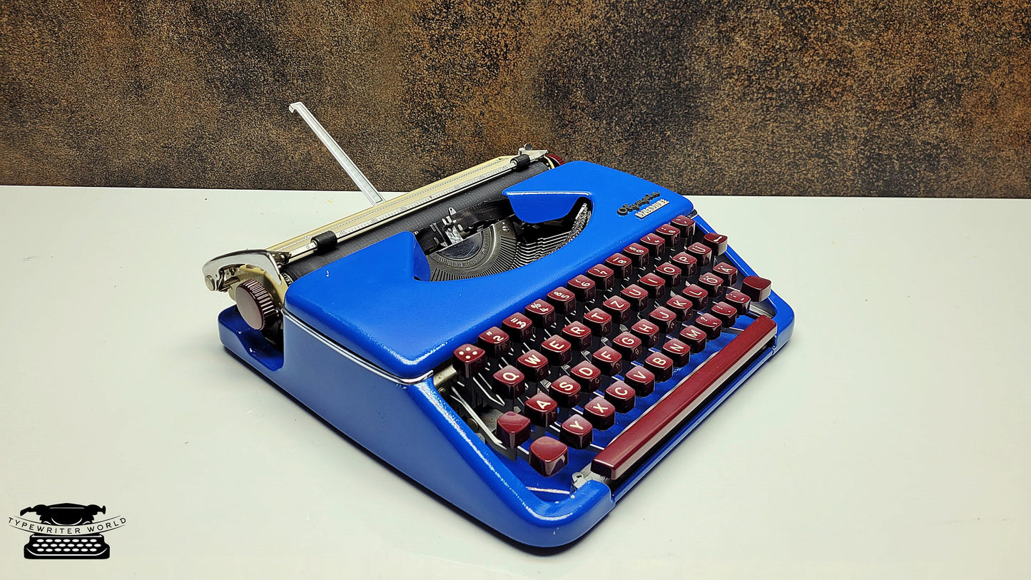 German-Made Olympia Splendid 33/66 Blue Typewriter with Mechanical Burgundy Keyboard and Case | Fully Refurbished Rare Writing Machine