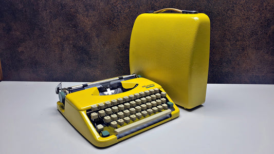 Vintage Olympia Splendid 33/66 Yellow Typewriter - Retro Mechanical Collectible for Office Decor - Unique Valentines Day Gift