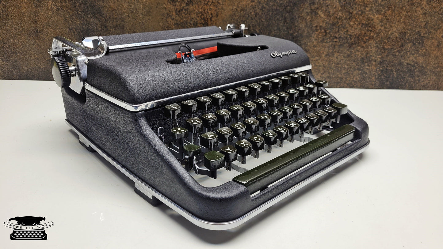 Olympia SM3 Black Typewriter, Premium Vintage Gift for Writers and Collectors, Elegant Collectible, Make Your Gift Unforgettable