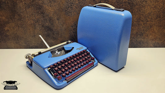 Vintage Olympia Splendid 33/66 Ice Blue Manual Typewriter with Burgundy Keys & Case | Rare Mid-Century Portable Writing Machine