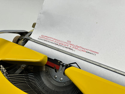Adler Tippa Typewriter - Vintage 1955 Model in Yellow with QWERTZ Keyboard and Leather Bag