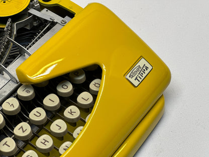 Adler Tippa Typewriter - Vintage 1955 Model in Yellow with QWERTZ Keyboard and Leather Bag