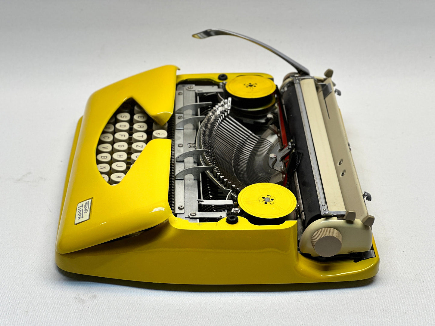 Adler Tippa Typewriter - Vintage 1955 Model in Yellow with QWERTZ Keyboard and Leather Bag