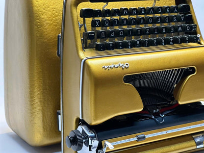GOLD Olympia SM3/SM4 Typewriter - Vintage 1955 Model in Luxurious Gold Finish with QWERTZ Layout  - gift for those who love money (: