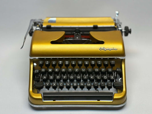 Premium Gold Olympia SM3/SM4 Typewriter - Vintage 1955 Model in Luxurious Gold Finish with QWERTZ Layout
