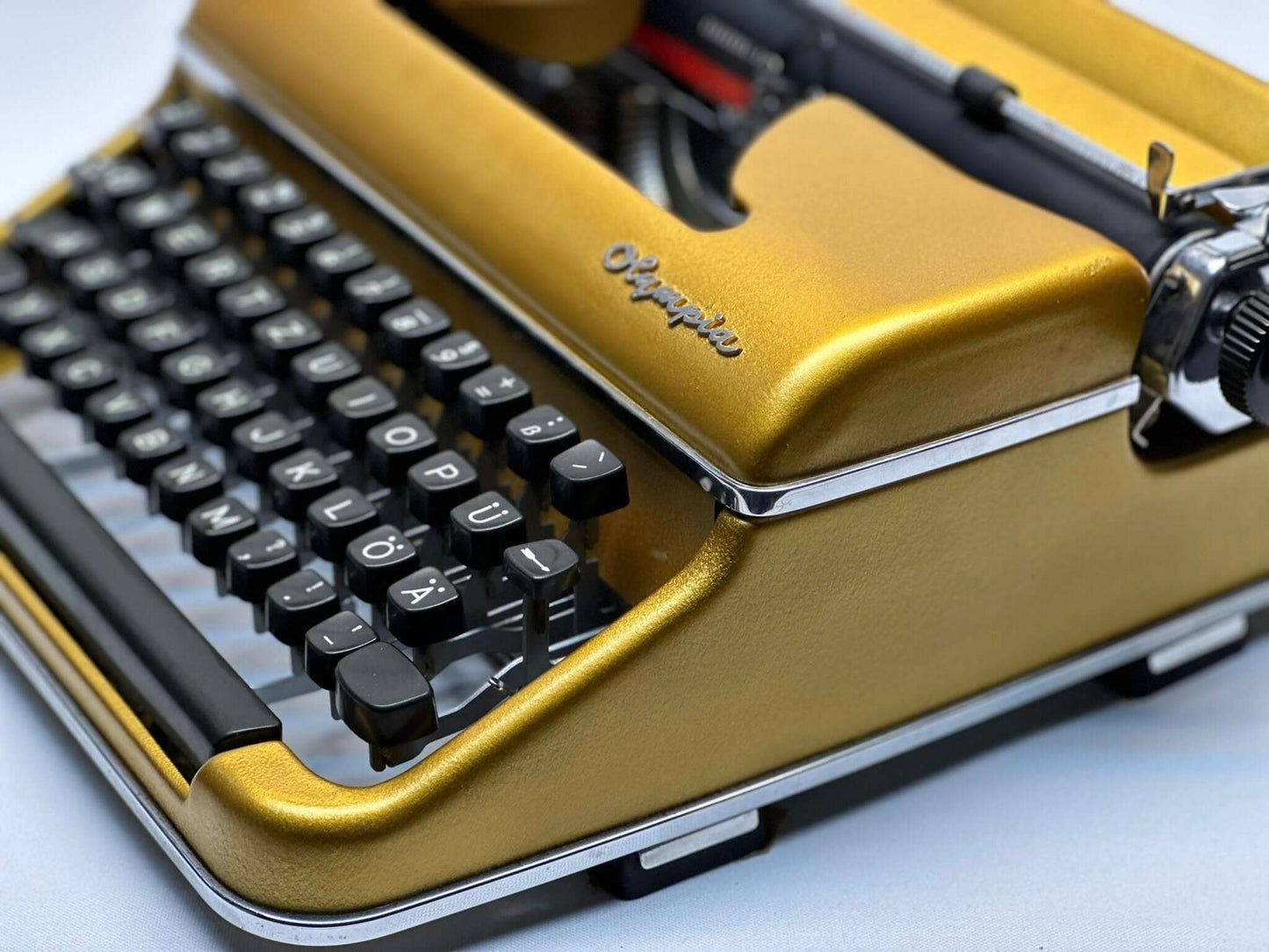 Premium Gold Olympia SM3/SM4 Typewriter - Vintage 1955 Model in Luxurious Gold Finish with QWERTZ Layout