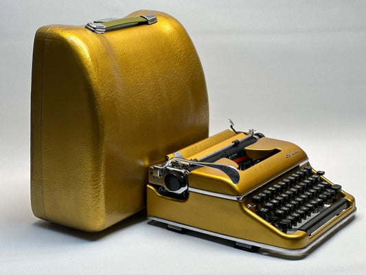 GOLD Olympia SM3/SM4 Typewriter - Vintage 1955 Model in Luxurious Gold Finish with QWERTZ Layout  - gift for those who love money (: