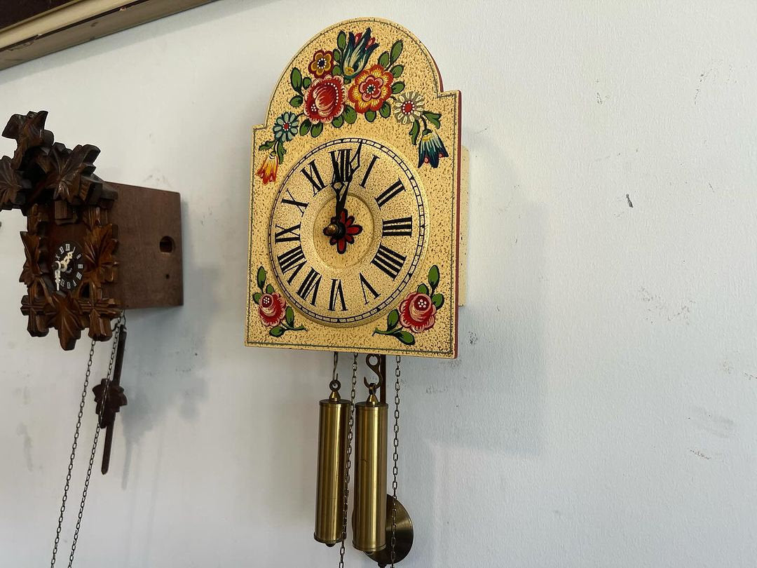 Antique Hermle Mini Wall Clock in perfect condition with floral design and pendulums.