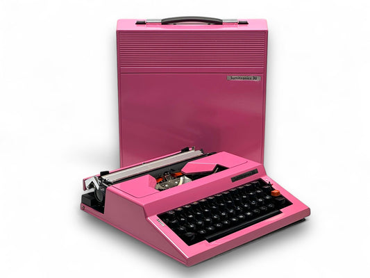 Vintage Pink Sumitronics 30 Manual Typewriter - Retro Portable Classic for Writers and Collectors