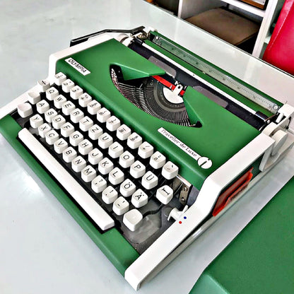 Vintage Elegance: Olympia De Luxe Typewriter in Green with Stylish Carry Bag - Fully Functional!