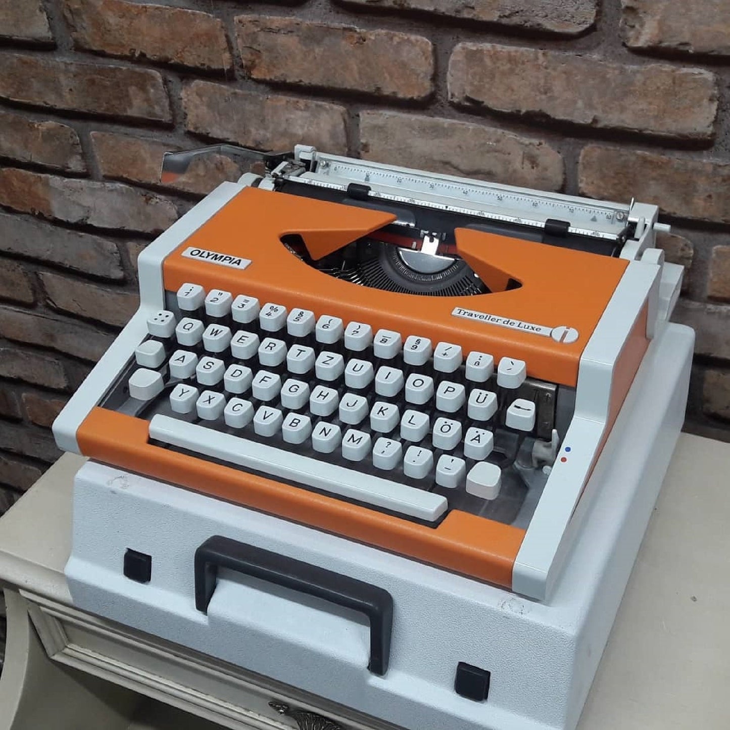Olympia Traveller Deluxe Typewriter - Fully Functional, Vibrant Orange, and Includes a Stylish White Bag