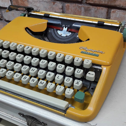 Olympia Splendid 33 Typewriter | Fully Operational | Yellow Elegance for a Splash of Vintage Style | Elevate Your Writing Experience!