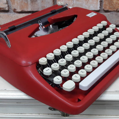 Adler Red Typewriter - A Timeless Elegance in Every Keystroke!