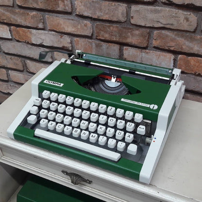 Green Olympia Traveller Deluxe Typewriter - Fully Functional. The Ultimate Gift for Timeless Elegance.