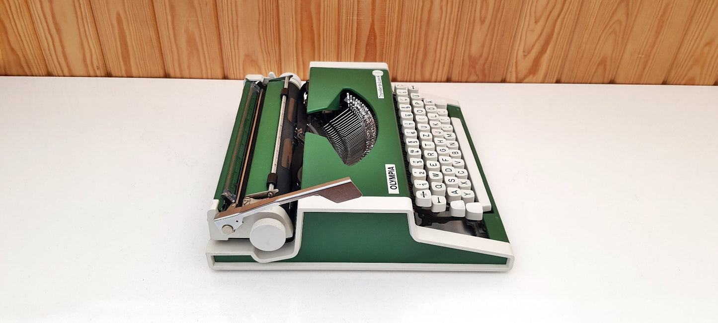 Green Olympia Traveller Typewriter - Vintage Elegance, Antique Mechanical Writing Machine from the 1960s, Classic Handwriting Tool