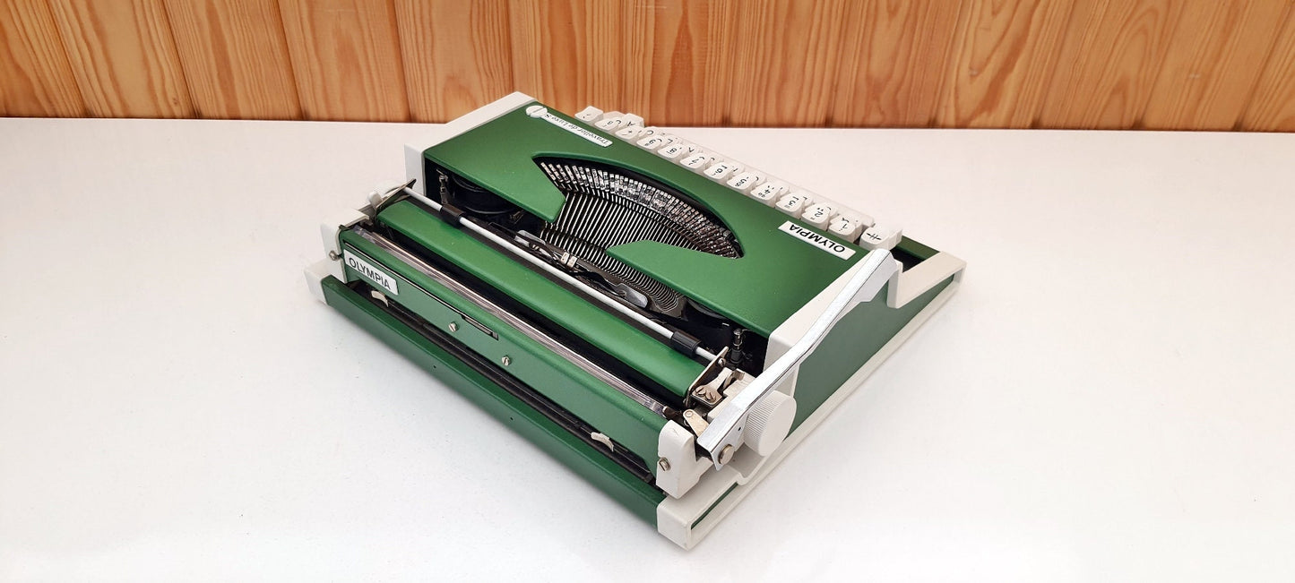 Green OLYMPIA TRAVELLER Typewriter | Vintage Typewriter | Antique Mechanical Writing Machine from the 1960s | Classic Handwriting Tool"