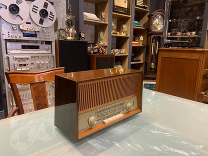 Loewe Opta Truxa Vintage Radio: A Symphony of Nostalgia and Modern Elegance with Antique Design and Lamp Feature