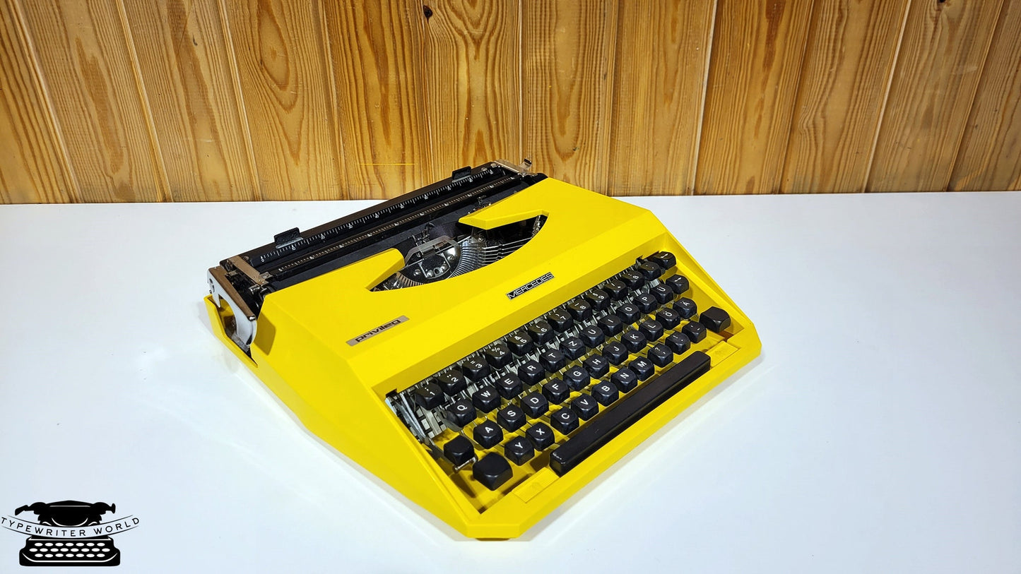 Mercedes Typewriter | Mercedes Yellow Typewriter |,typewriter working