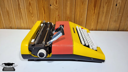 Olivetti Typewriter | Like-New Working Typewriter | Yellow Typewriter with Pink Cover and White Keyboard