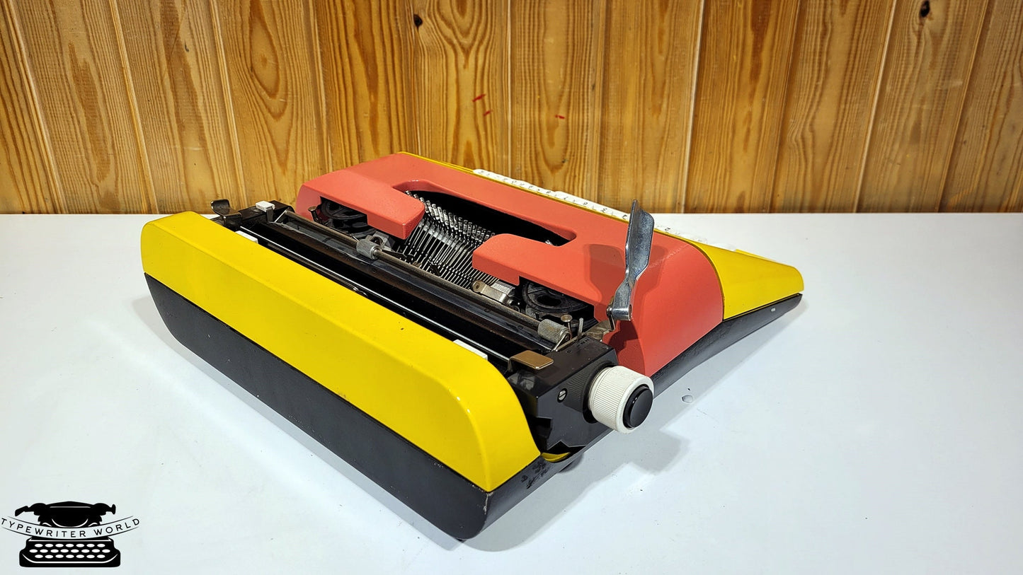 Olivetti Typewriter | Like-New Working Typewriter | Yellow Typewriter with Pink Cover and White Keyboard