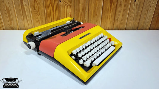 Olivetti Typewriter | Like-New Working Typewriter | Yellow Typewriter with Pink Cover and White Keyboard