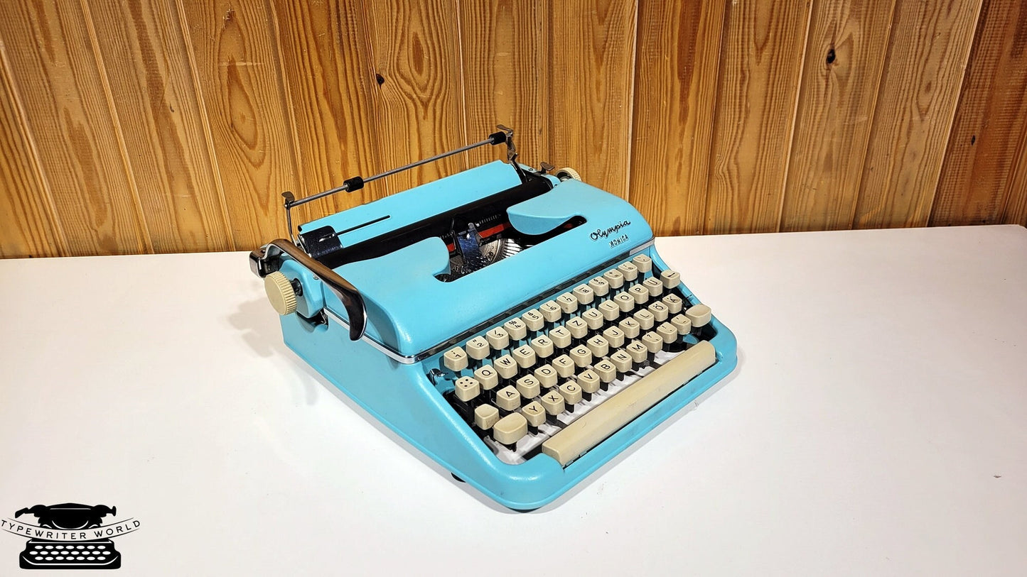Olympia Monica 1960 Typewriter - Vintage Elegance in Striking Blue
