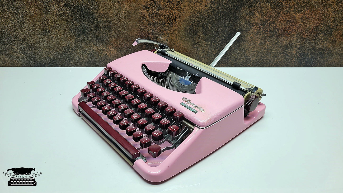 Restored Olympia Splendid 33/66 Ice Pink Typewriter with Mechanical Burgundy Keyboard and Case | Vintage QWERTY Typewriter for Writers