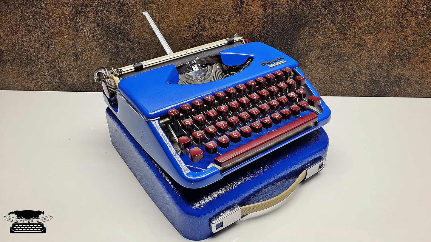 German-Made Olympia Splendid 33/66 Blue Typewriter with Mechanical Burgundy Keyboard and Case | Fully Refurbished Rare Writing Machine
