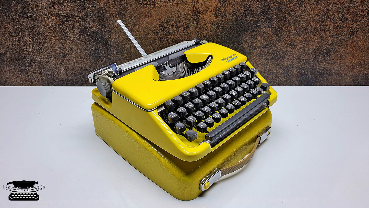 Vintage Olympia Splendid 33/66 Yellow Typewriter| Rare Writing Machine, Perfect as a Gift for Creatives,Collectors, and Typewriter Enthusias