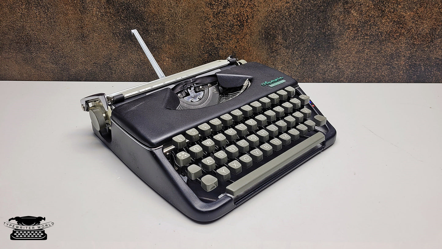 Restored Antique Olympia Splendid 33/66 Black Typewriter with Grey Keyboard and Case - Superb Gift for Typewriter Enthusiasts