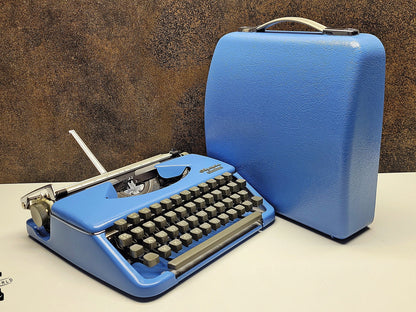 Vintage Olympia Splendid 33/66 Vintage Blue Typewriter - The Perfect Writing Tool for Authors and Collectors