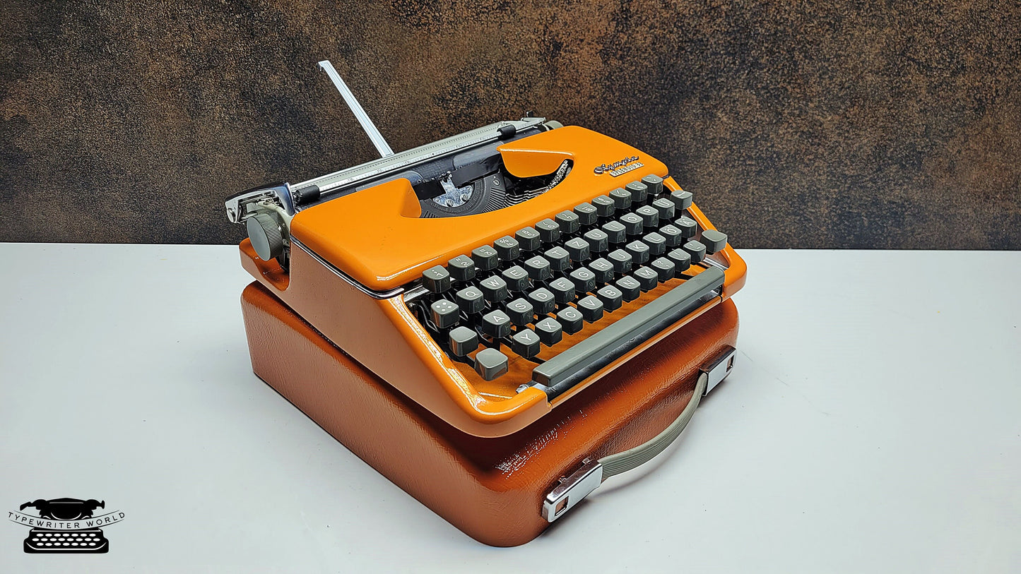 Vintage Olympia Splendid 33/66 Vintage Orange Typewriter - A Unique Crafting Tool for Scrapbookers and DIY Enthusiasts