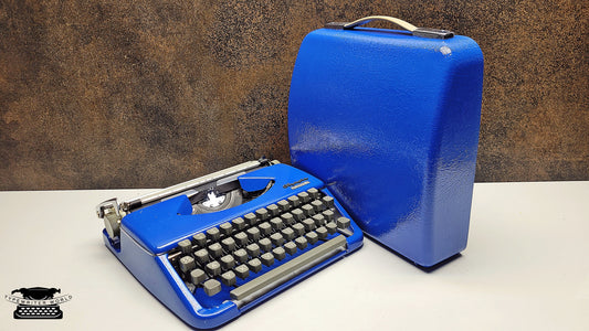 Vintage Olympia Splendid 33/66 Blue Typewriter - A Unique Crafting Tool for Scrapbookers and DIY Enthusiasts