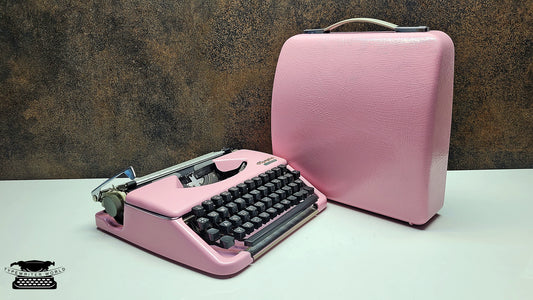 Portable Olympia Splendid 33/66 Vintage Ice Pink Typewriter with Black Keyboard - Ideal for Traveling Writers and Students