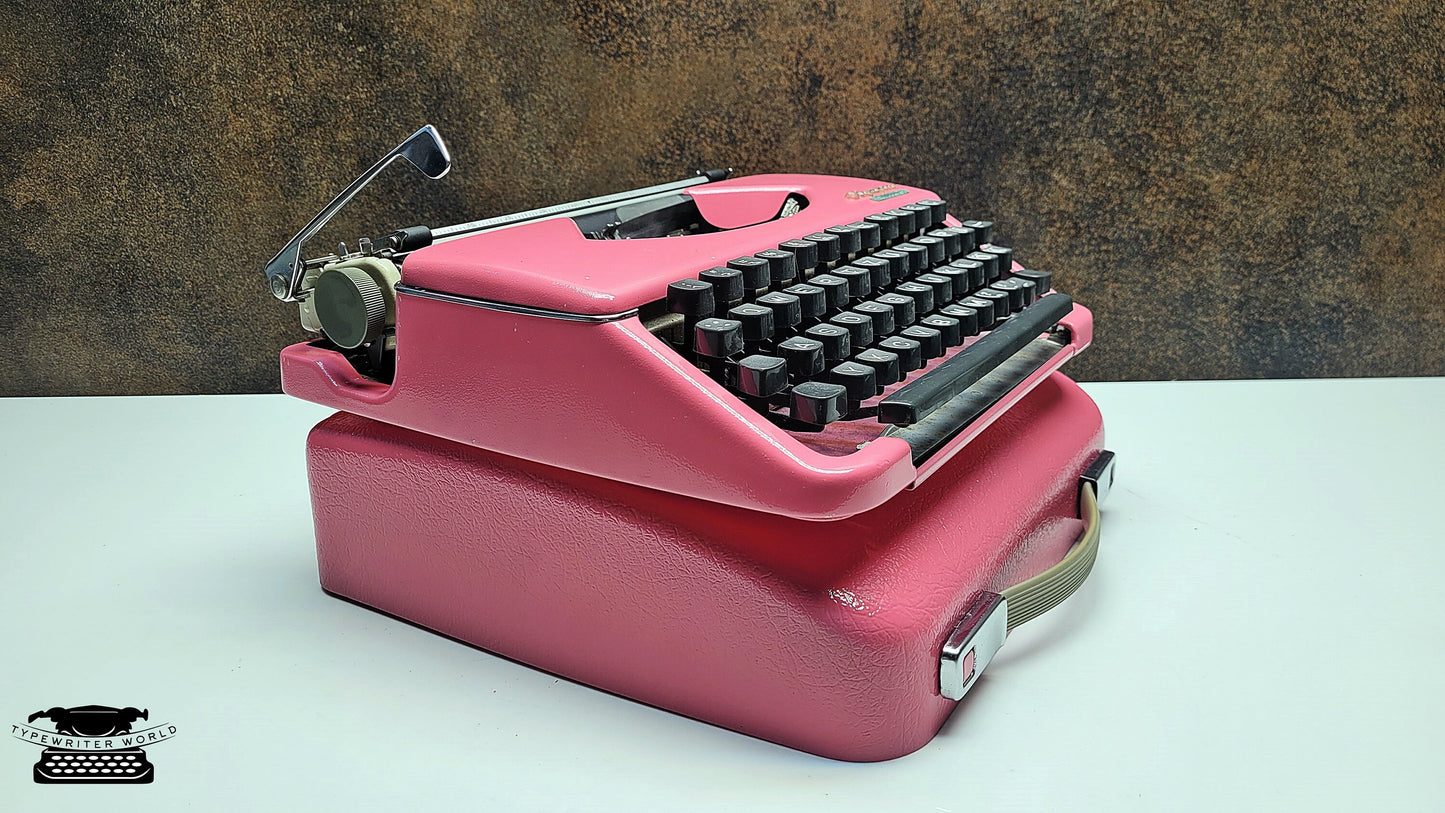 Portable Olympia Splendid 33/66 Vintage Pink Typewriter with Black Keyboard - Ideal for Traveling Writers and Students