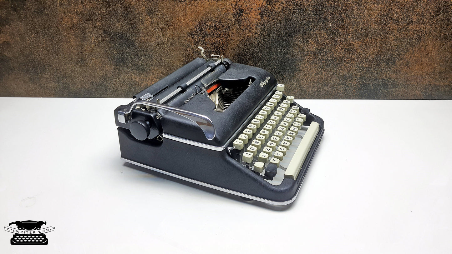 Vintage Olympia SM5 Black Typewriter - Working and Fully Restored - Ideal for Writers and Collectors,typewriter working