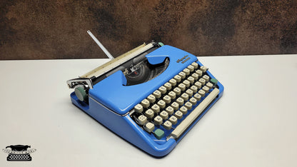 Vintage Olympia Splendid 33/66 Vintage Blue Typewriter - Retro Mechanical Collectible for Office Decor