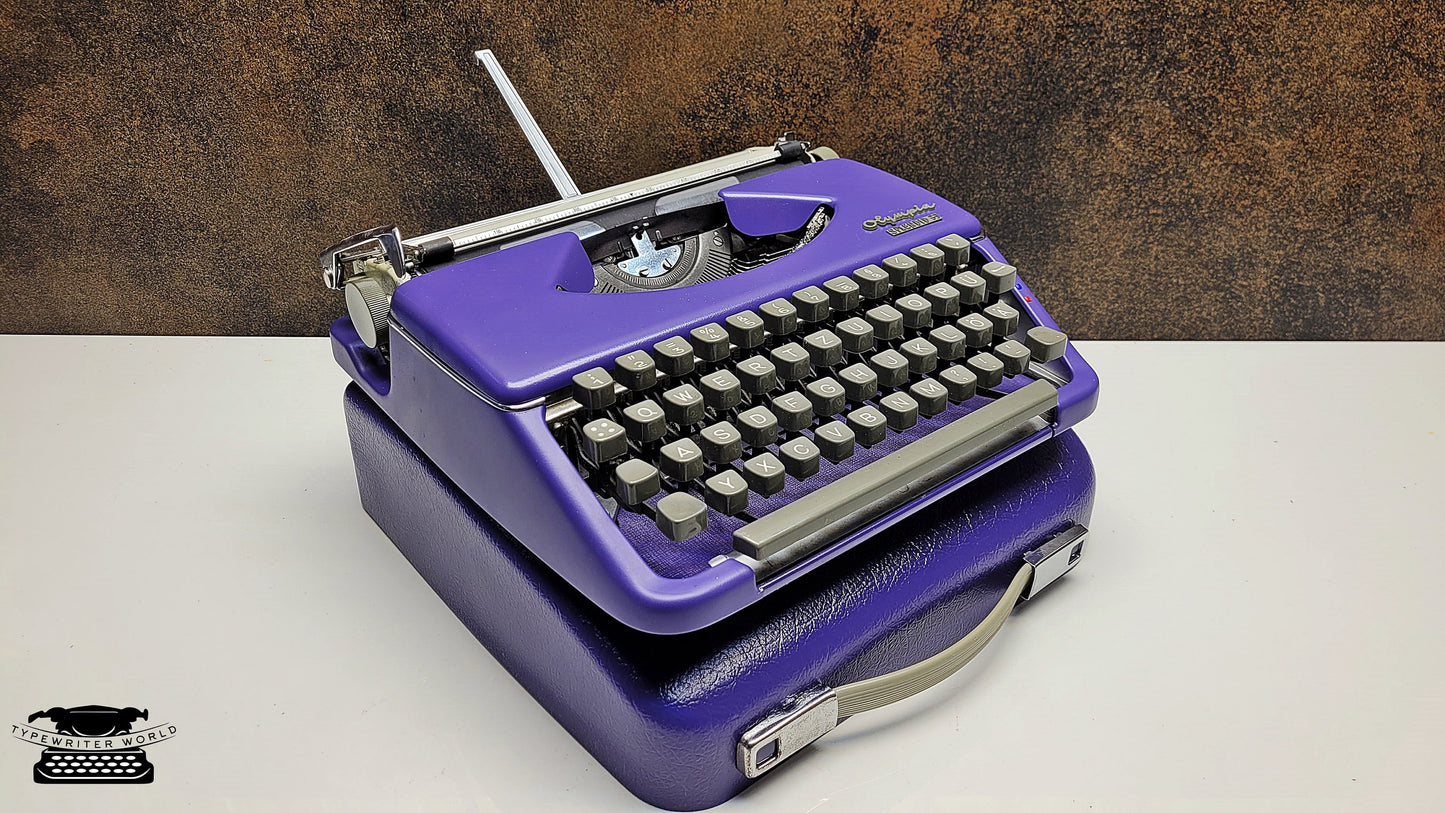 Vintage Purple Olympia Splendid 33/66 Typewriter and Case | Refurbished Writing Tool - Perfect Gift for Writers, Collectors