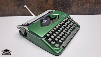 Vintage Olympia Splendid 33/66 Crystal Green Typewriter - A Classic Tool for Typing Enthusiasts and Analog Technology Fans
