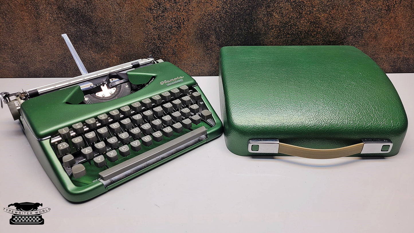 Vintage Olympia Splendid 33/66 Crystal Green Typewriter - A Classic Tool for Typing Enthusiasts and Analog Technology Fans